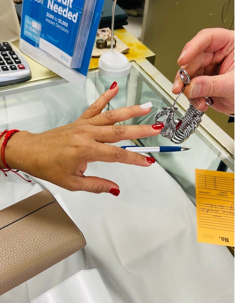 Customer being served at MV Jewelry Exchange counter